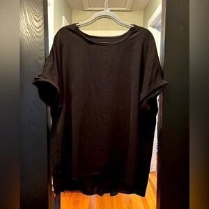 Black short sleeved top.